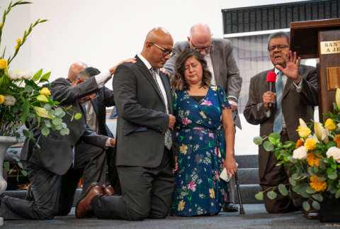 Salazar offers the ordination prayer for Ellis Flores.
