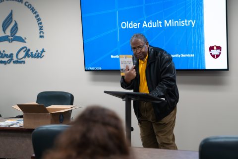 Lee gives a presentation on older adult ministry at an Adventist Community Services training event in the SCC office.