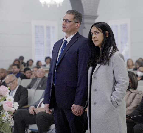 Rivera and his wife stand to receive the call to ministry as Royal Harrison, SCC Executive Secretary, addresses them.