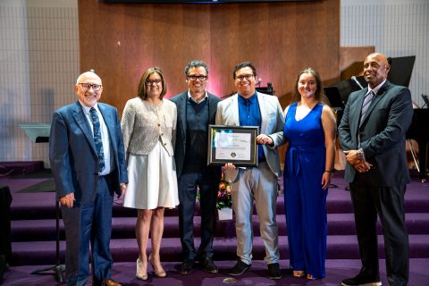 Caishpal and his wife, Cherith, pose with SCC executive officers as he holds his ordination certificate.