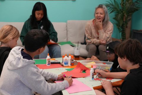 Sharon Tanghal, L.C.S.W., leads kids in an activity in understanding their emotions.
