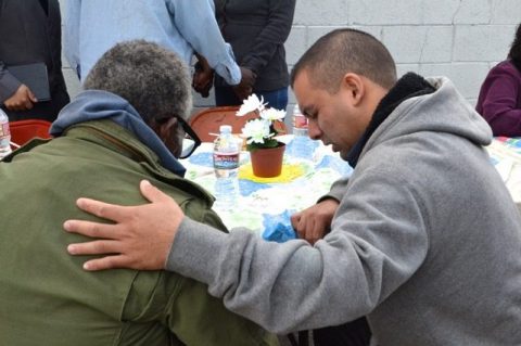 In addition to food, clothing and other items, guests were also offered personal prayer. Photo courtesy of Gladys Pacheco