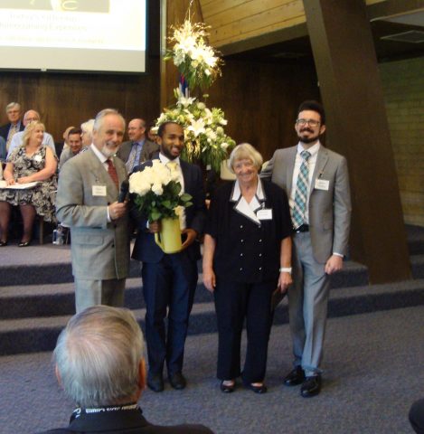 Darlene Dickenson received roses for coordinating "a great team of leaders" for the entire anniversary celebration. Photo by Connie Vandeman Jeffery