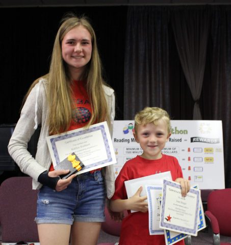 Eighth grader Kaitlyn Stubbert read 10,520 minutes.  Kindergartener Isaac Meager raised the most money, soliciting $4,150 in sponsor money. Photo by Joan Hsu