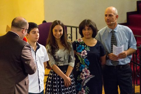 (on l.) The week following Dr. Sarrafian’s retirement, Glendale City church Pastor Todd Leonard welcomes (r. to l.) Pastor Vigen and Mrs. Inga Khachatryan, daughter Noemi and son Daniel. Photo by Mark Azali