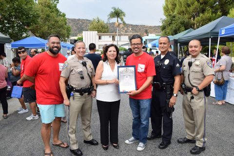 This year, L.A. County Supervisor Hilda L. Solis attended the event for the first time, presenting the church with a commendation on the 5th year anniversary of hosting law enforcement and the community on National Night Out. (l. to r. Associate Pastor Pono Lopez; CHP Officer Tiffany Hoff; Supervisor Solis; Senior Pastor Danny Chan; LAPD Senior Lead Officer Fernando J. Ochoa; and CHP Officer Chad Guin.) / Photos by Mel Afenir and Virna Chan