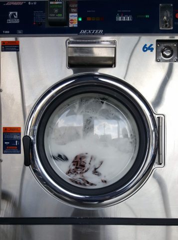 The church runs multiple loads of laundry per day to clean towels used for showers. Photo by Andrew Pyles-Froemming