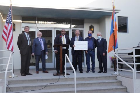 SCC leadership presents the congregation with a check for $2,500 to support their ongoing ministry as a company. (left to right) Velino A. Salazar, SCC president; John H. Cress, SCC executive secretary; James G. Lee, SCC executive vice president; Vigen Khachatryan, pastor; Aramis Vartanians, treasurer; and Hovik Saraffian, retired pastor.