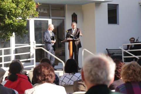 Salazar (right) encourages the congregation to remain steadfast in the mission moving forward as an organized company as Khachatryan (left) translates.