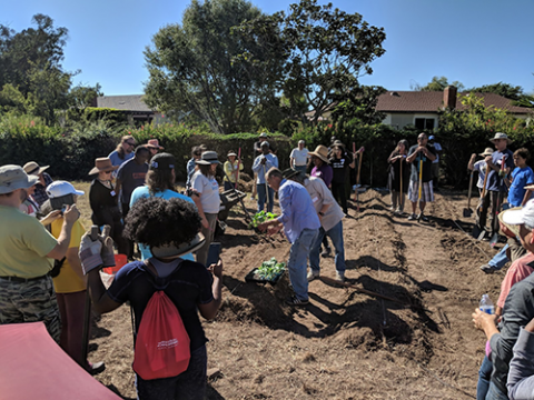 Hoag gives planting instructions to the community and church members who showed support for a community garden by attending the first garden workshop in fall 2018.