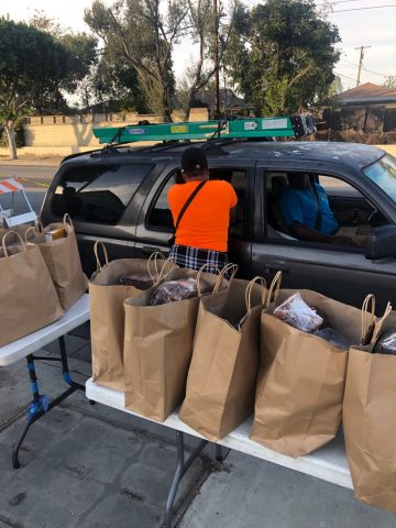 The church is active in community outreach, hosting a quarterly concert, preparing 1,000 grocery bags for Thanksgiving, distributing 500 toys for Christmas, and giving away clothing in the summer.