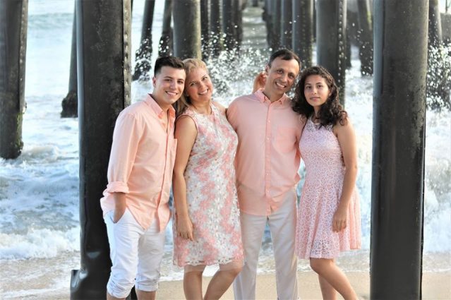 Heras enjoys a moment with his wife, Emma, and two children, Edward and Joysel.