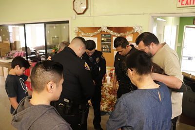 Different groups of officers were prayed over throughout the day to pray with and for them before they went back to work.