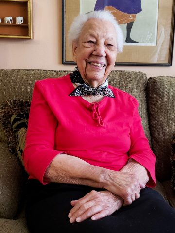 Anita Mackey, who celebrated her 105th birthday on Jan. 1, smiles inside her living quarters at Scholl Canyon Estates. Photo by Linton Manier.