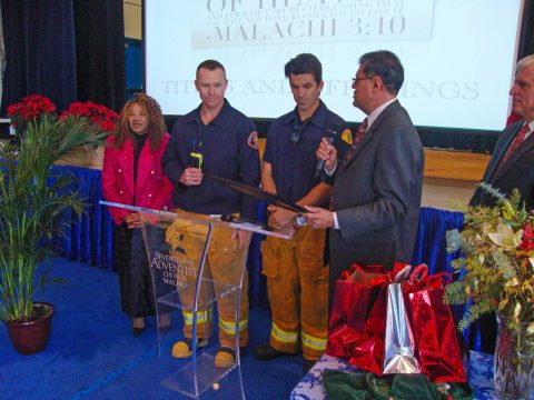 SCC President Velino A. Salazar presents a plaque to Captain Todd Garvey and firefighter Alan Averill of the Malibu Fire Department in appreciation for their extraordinary service during the Woolsey Fire. Photos by Connie Jeffery.