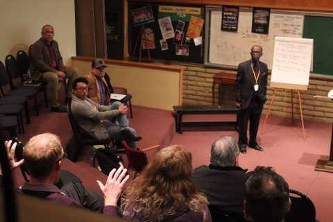 Israel Olaore, Glendale Adventist Academy principal (standing, right), listens intently as Tim Hansen, GAA music teacher (bottom left), excitedly shares his perspective on how GAA’s constituent churches can work with the school for mutually beneficial growth.