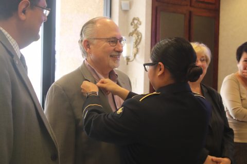 Each honoree received a patriot award lapel pin with both the American flag and ESGR flag. Cress is seen here receiving his pin from de Asis.