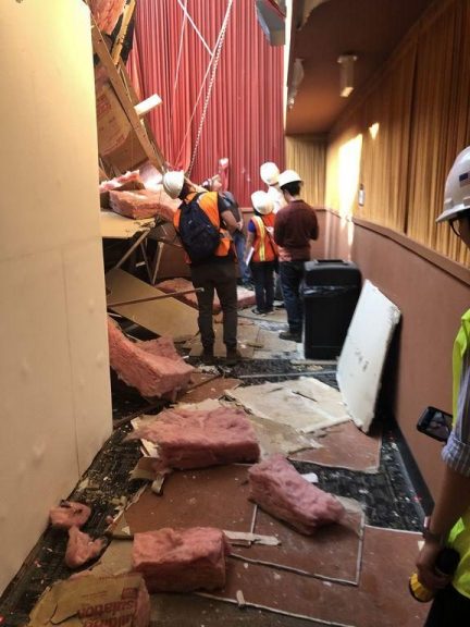 Workers survey the damage from the collapsed roof at Rigecrest Cinemas after Friday night's earthquake. Credit: Ridgecrest Daily Independent