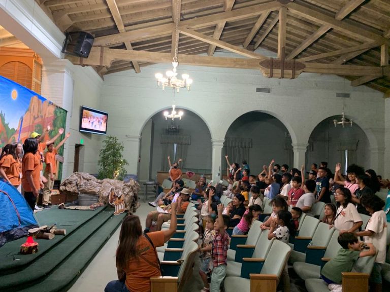Children sing along to the
interactive music. Of the approximately 60 kids who attended VBS each night, 15 were new to the church
from the neighborhood.
