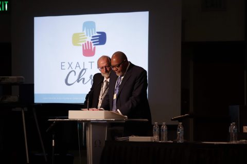 Ricardo Graham, Pacific Union Conference president and nominating committee chair, and Richard Guy, nominating committee secretary, present the nominating committee report.