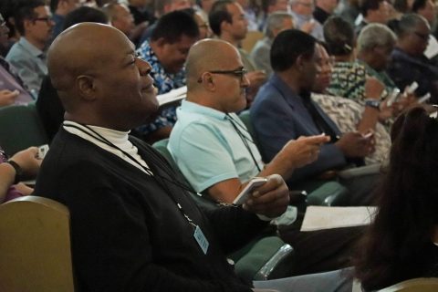 Delegates exercise their voice through electronic votes.