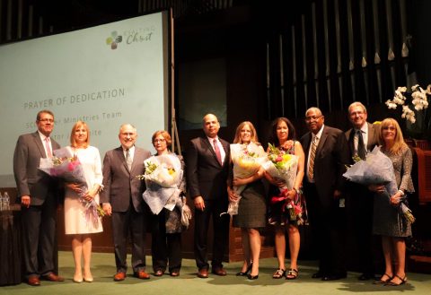 Elected officers are pictured with their spouses following a prayer of dedication by the SCC prayer and spirituality team.