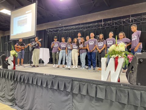 SCC student evangelists gather on stage at the iShare Conference, the culmination of the summer for all Youth Rush participants in the Pacific Union.