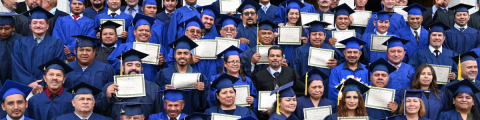 Graduates are gathered outside of Spanish-American church after receiving their certificates.