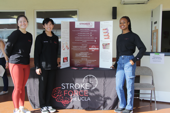 Students from UCLA pose at their booth before educating attendees about stroke signs, symptoms, and risk factors. 