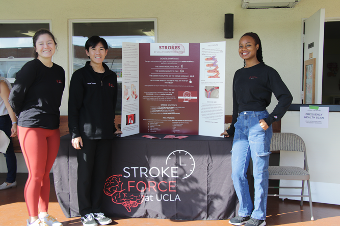 Students from UCLA pose at their booth before educating attendees about stroke signs, symptoms, and risk factors.
