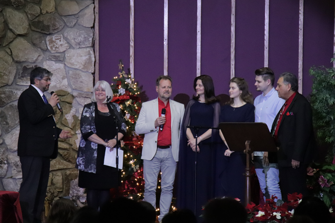 (From left to right) Mikel, Jan, Andrew, Lena, Hannah, Daniel, Phil. Andrew and Lena alternate sharing messages of appreciate while Mikael translates.