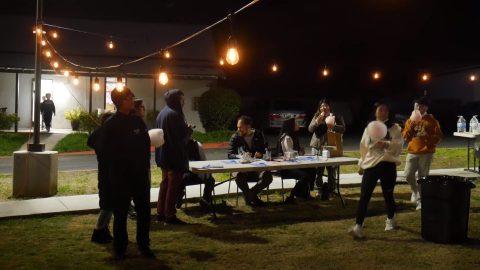 Participants enjoy cotton candy during the festival.