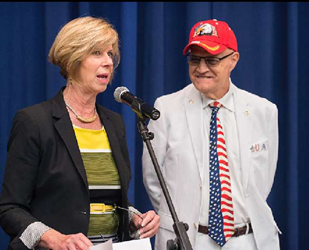 On behalf of the L.A. County Board of Supervisors, Supervisor Janice Hahn presents Harry Bey with two awards commemorating his years of service. Photos provided by Harry Bey.