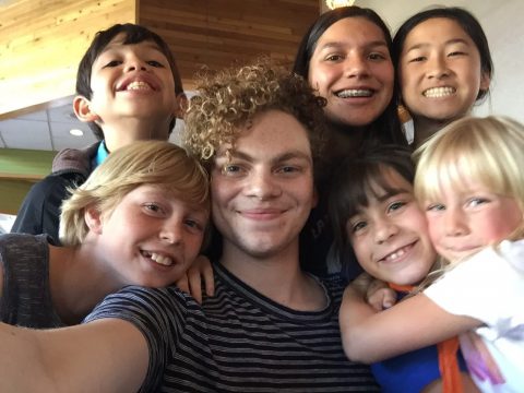 Marcus takes a selfie with some of his younger Sabbath School students. Photo provided by Cheryl Caglese.