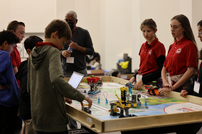 Team Cougars 1 from Conejo Adventist Elementary School practice before their next round.