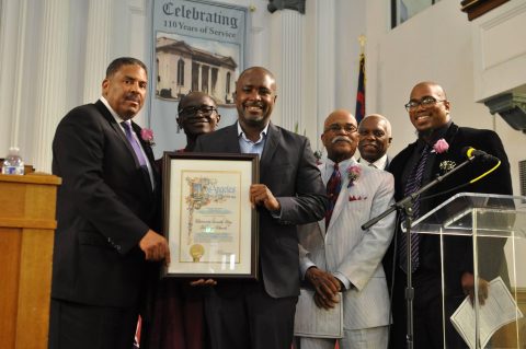 (From left) Lawrence Dorsey Sr., University church senior pastor; Israel Olaore, Glendale Adventist Academy principal; Marqueece Dawson-Harris, District 8 councilmember; David Taylor, former University church pastor; Virgil Childs, director of Pacific Union Conference Regional ministries; and Donavan Childs, University youth and young adults pastor, display a Recognition of Service Award presented to the church from the City of Los Angeles.