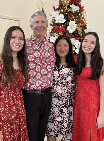 Geoffrey poses for a Christmas 2022 photo at the Aiea church with his wife and daughters. (Left to right) Katie, Geoffrey, Esther, and Elisabeth.