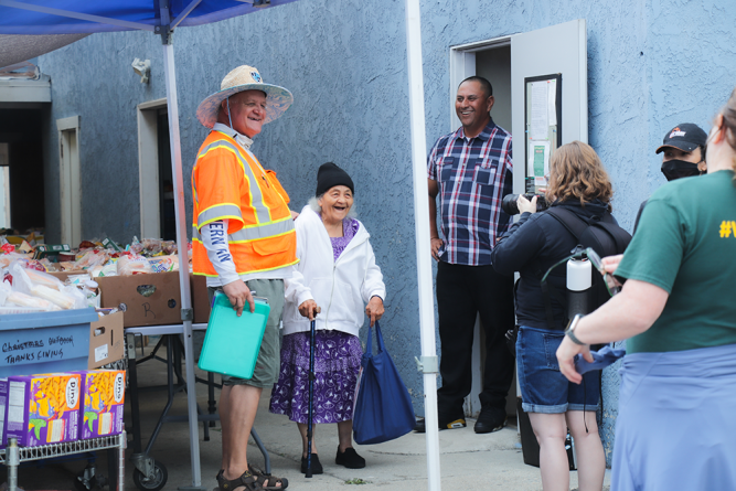 Mama Rosa, the founder of the food pantry in 1994, visits for the first time since the pandemic on Sept. 16, 2023.