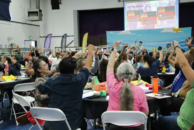 Attendees participate in a group activity at the training event in October 2023.