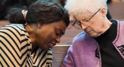 Attendees gather throughout the program for seasons
of prayer.