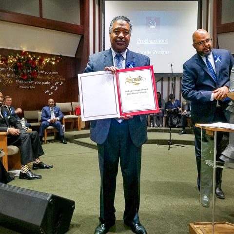 Trusty shows the letter from California State Senator Bob Hertzberg, which expressed gratitude for the church’s contributions in the community.
